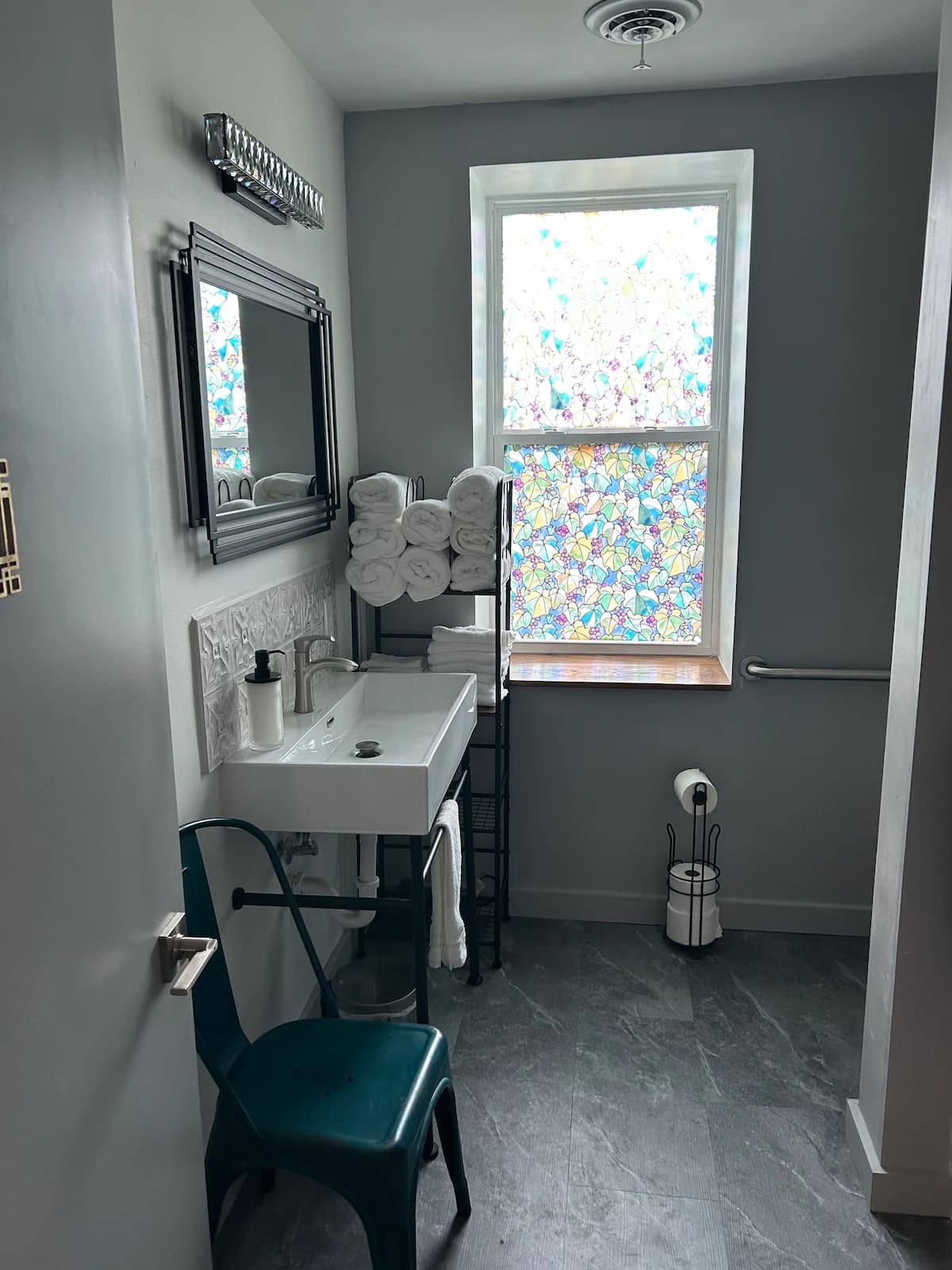 Full bathroom with walk in shower with bench